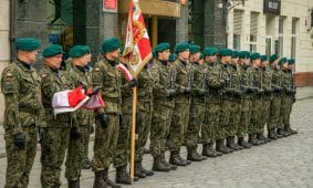 Polish soldiers in uniform during a ceremonial formation in Wrocław, Poland.