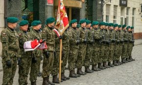 Polish soldiers in uniform during a ceremonial formation in Wrocław, Poland.
