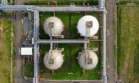 Aerial view of large industrial storage tanks in Banten, Indonesia, showcasing infrastructure and industry.