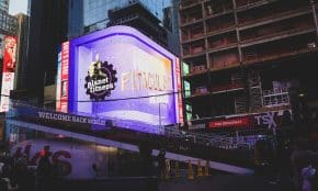a group of people standing outside of a building
