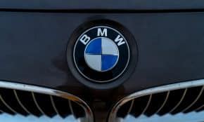 a close up of a bmw emblem on the front of a car