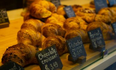a bunch of croissants that are on a table