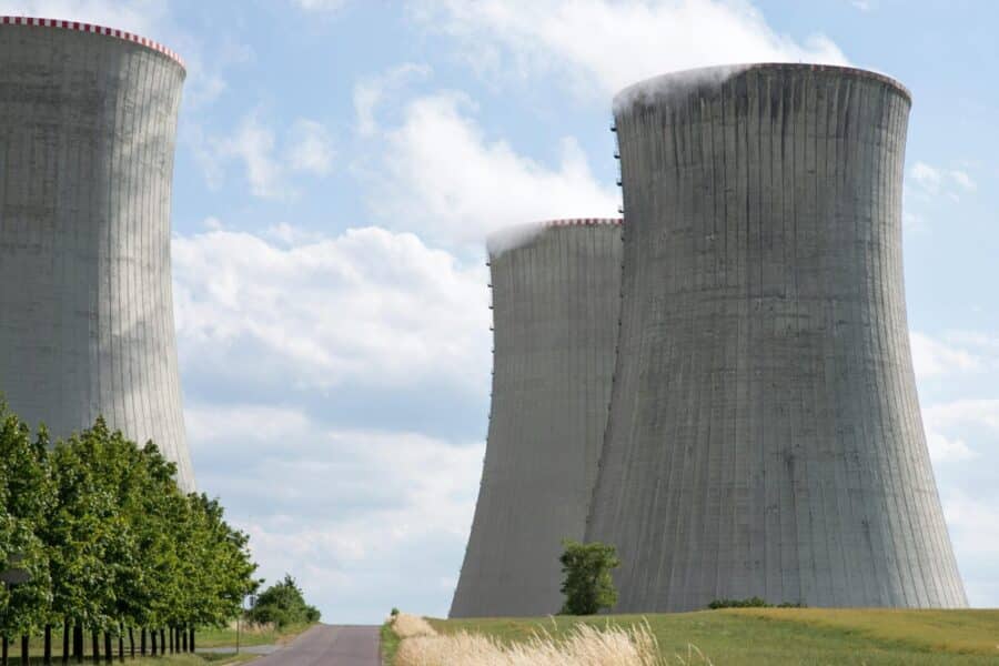 Cooling towers of Dukovany nuclear power plant with steam on a clear day.