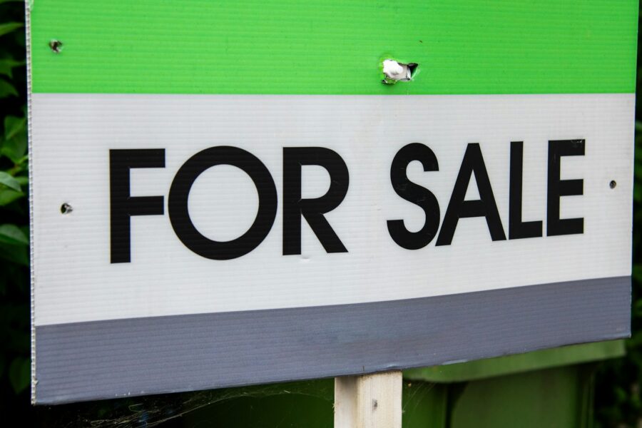 Apartment building exterior sale sign