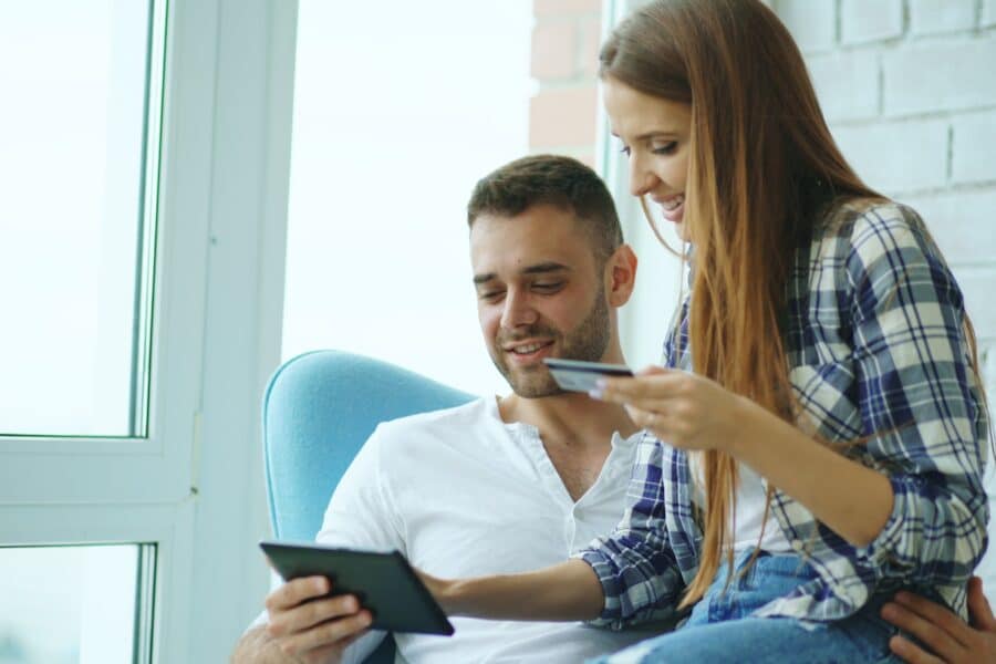 Young couple paperwork apartment mortgage documents