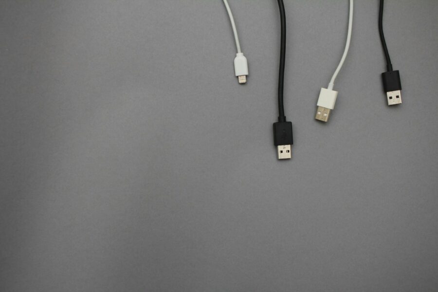 Smartphone charging cable desk closeup