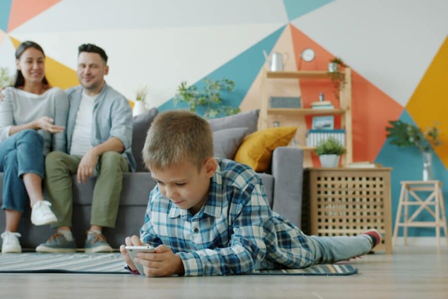 Parent child smartphone tablet living room