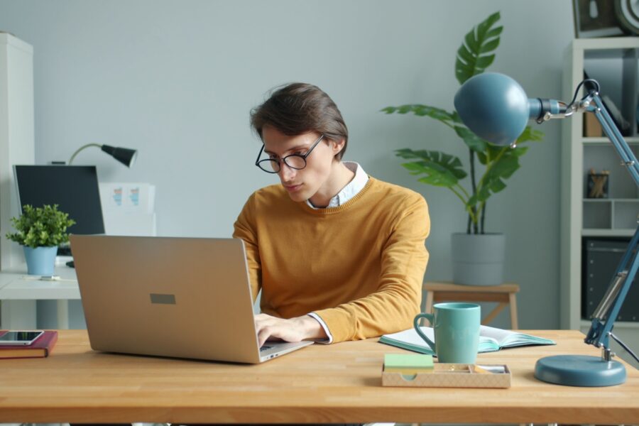 Credit report laptop young adult desk