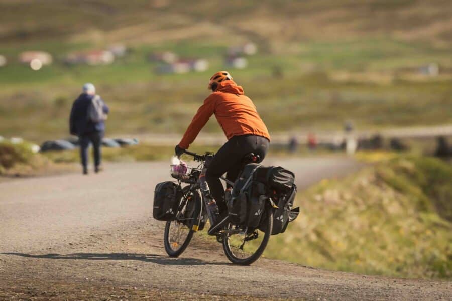 Bicycle tour countryside road backpack