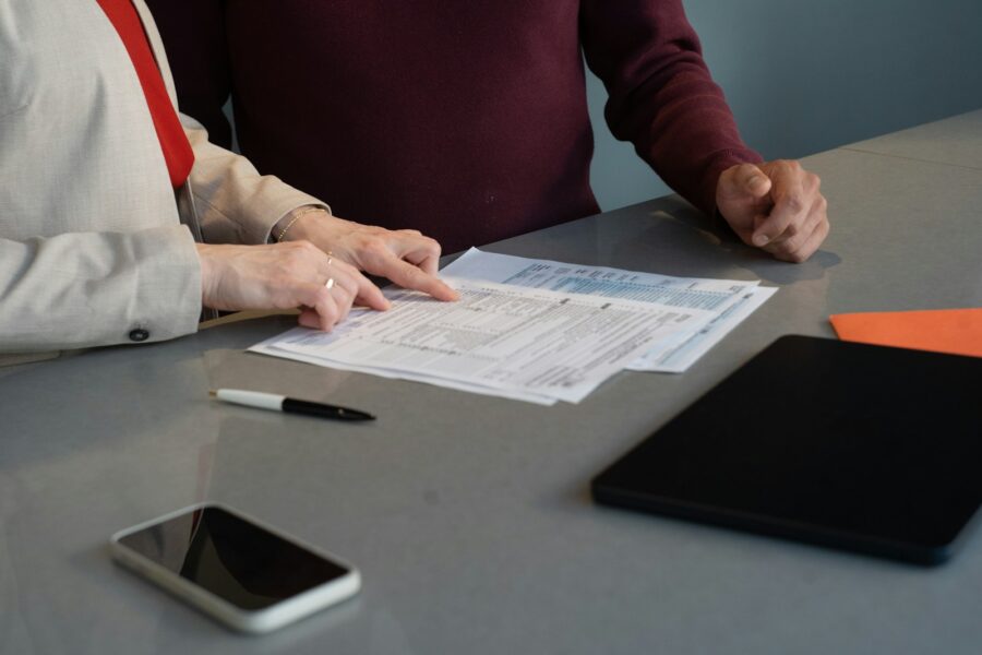 Office meeting salary discussion table documents