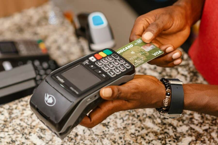 Payment terminal credit card hand supermarket checkout