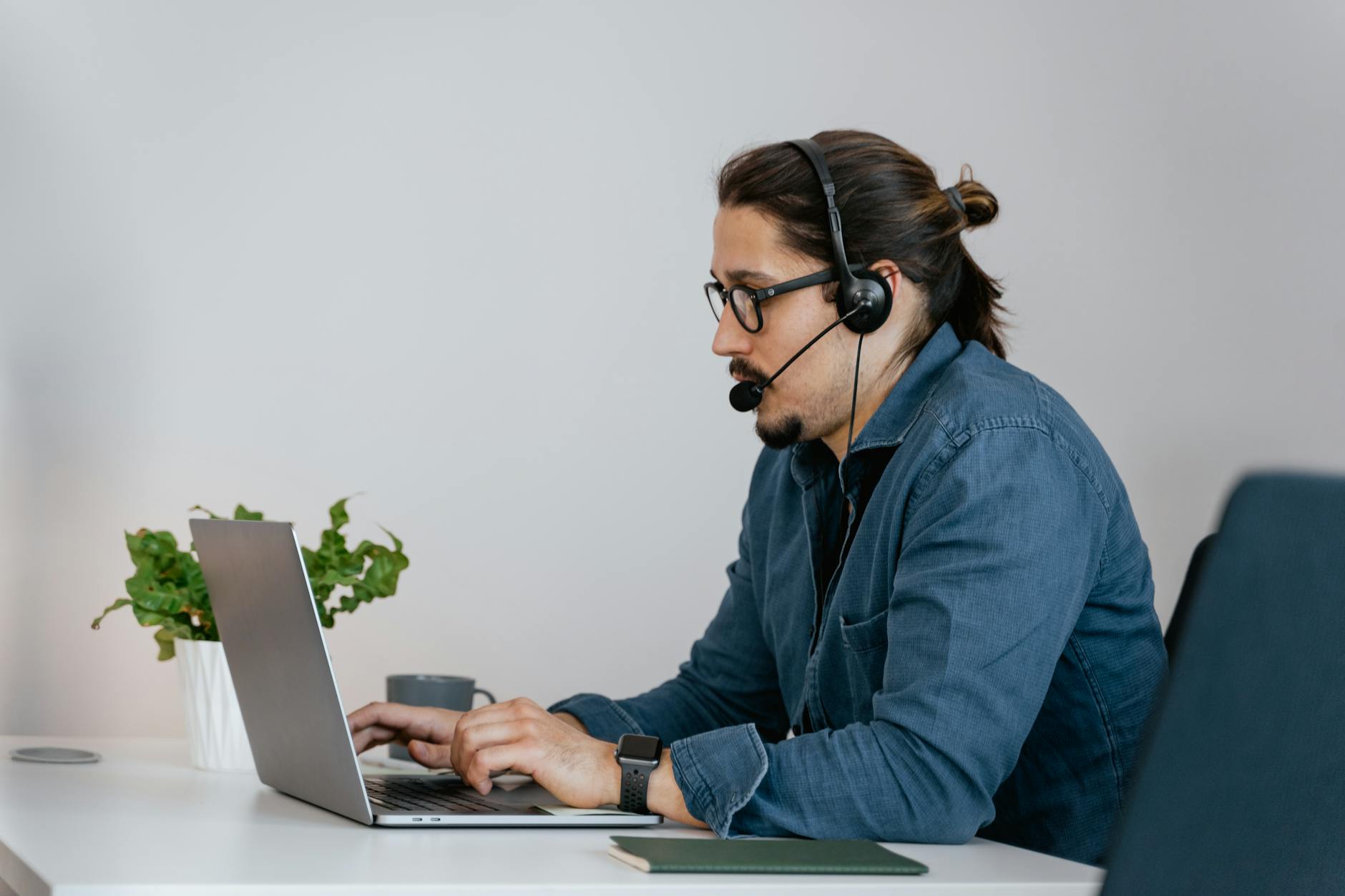 Remote work home office headset laptop customer support